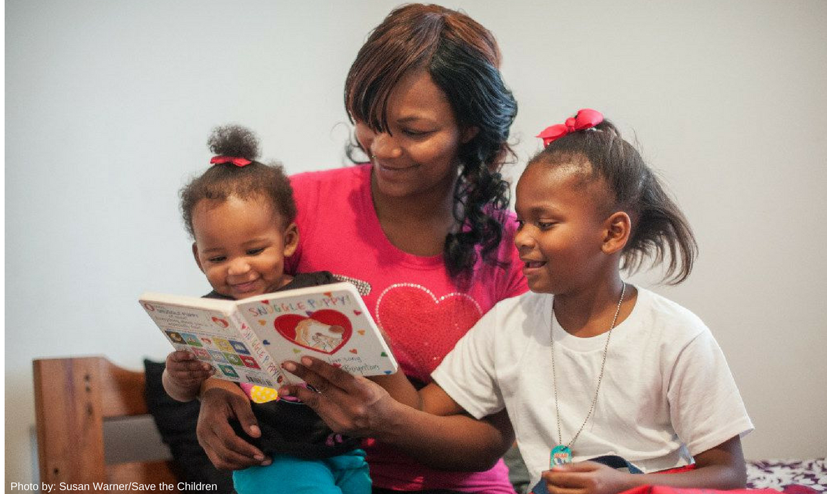 Porshia reading to her kids