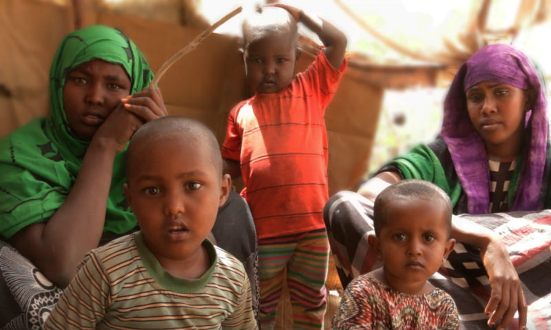 Zaniab, left, with her children